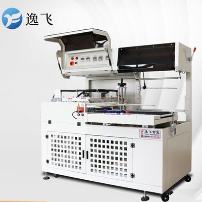 建築工事 食品用紙箱用自動L型収縮包装機