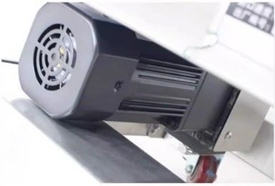 垂直重荷 20kg 連続帯密封器を電動で動かす密封機